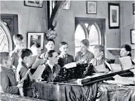  ?? ?? Jackson, above, rehearsing his choir in the early 1960s and, left, as a chorister in 1929