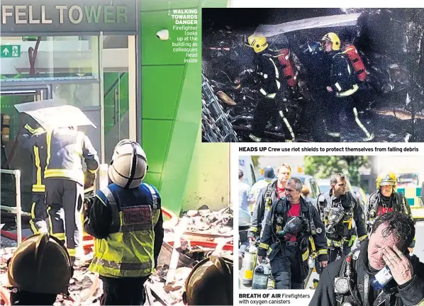  ??  ?? WALKING TOWARDS DANGER Firefighte­r l ooks up at the buildi ng as colleagues head inside HEADS UP Crew use riot shields to protect themselves from falling debris