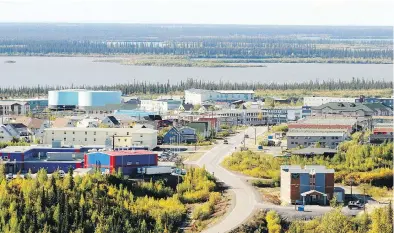  ?? LEAH HENNEL / POSTMEDIA NEWS FILES ?? The Dempster highway ends at the small Arctic community of Inuvik, N.W.T., that sits beside the Mackenzie River that flows into the Beaufort Sea. N.W.T. is hoping for a resumption of oil and gas exploratio­n.