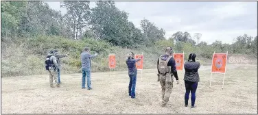  ?? (Submitted Photo) ?? Members of the Bella Vista Police Department Citizens Police Academy class of the fall of 2022 take part in supervised firearms training.