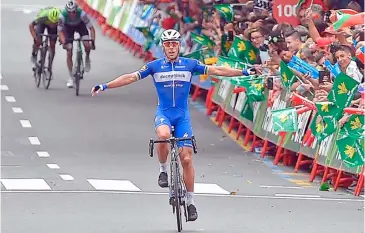  ??  ?? PHILIPPE Gilbert takes Stage 12 in dominating fashion.