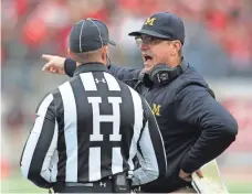  ?? JOE MAIORANA, USA TODAY SPORTS ?? Coach Jim Harbaugh complained about the officiatin­g Saturday, leading the Big Ten to fine Michigan $10,000.