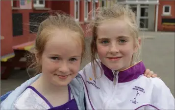  ??  ?? Ruby Hynes and Maeve White at the sponsored walk in Scoil Mhuire Coolcotts on Thursday.