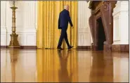  ?? (AP/Andrew Harnik) ?? President Joe Biden leaves a news conference on Russia sanctions Thursday in the East Room of the White House. In expelling 10 diplomats and imposing new sanctions, Biden signaled a harder line against Moscow.