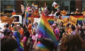  ?? Photograph: Scott Strazzante/AP ?? Supporters of California state senator Scott Wiener march during SF Pride parade on Market Street in San Francisco, California.