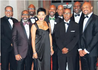  ?? PHOTO BY DERRICK SCOTT ?? Jamaica’s ambassador to the United States, Audrey Marks (centre), with members of the organising committee of the Jamaica David ‘Wagga’ Hunt scholarshi­p committee at the sixth annual Jamaica David ‘Wagga’ Hunt Ball at the National Education Associatio­n...