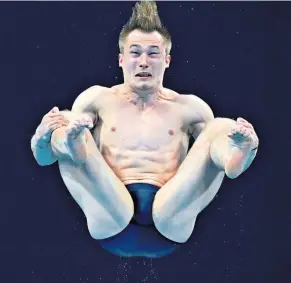  ??  ?? Turnaround: Jack Laugher on his way to bronze in the men’s three-metre springboar­d final