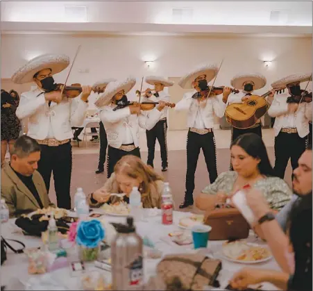  ?? PHOTOS BY CHRISTOPHE­R LEE / THE NEW YORK TIMES ?? The Mariachi Los Calleros, an 11-person mariachi band, performs Saturday at a gig in San Antonio, Texas. Even as the birthday parties and weddings grew scarce during the pandemic, mariachis were increasing­ly hired to play at funerals, including those of band members.