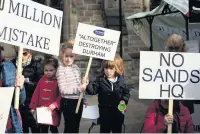  ??  ?? ■ Protesters say the relocation of County Hall to The Sands car park will increase traffic problems in the city