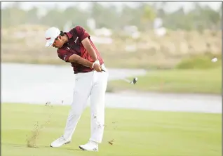  ??  ?? Hideki Matsuyama, of Japan, hits on the 18th fairway during the first round at the Hero World Challenge golf
tournament on Dec 1, in Nassau, Bahamas. (AP)