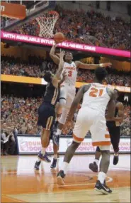  ?? NICK LISI — ASSOCIATED PRESS ?? Syracuse’s Andrew White III shoots over Georgia Tech’s Tadric Jackson in the second half of Saturday’s game at the Carrier Dome in Syracuse.