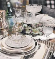  ??  ?? It’s time for the vintage china dishes, silver serving pieces and old glassware to come out of the china cabinets.