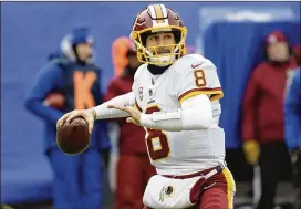  ?? BILL KOSTROUN / ASSOCIATED PRESS 2017 ?? Quarterbac­k Kirk Cousins threw for 16,206 yards and 99 touchdowns over his six seasons with the Redskins. With Washington expected to complete a trade for Kansas City’s Alex Smith, the Broncos, Jets and Cardinals could jockey to see who will pay free...