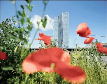  ?? PHOTO: REUTERS ?? The European Central Bank headquarte­rs in Frankfurt. In October it extended its asset purchases until September 2018.