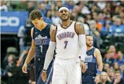  ?? [AP PHOTO] ?? Carmelo Anthony, right, scored 16 points in 27 minutes during the Thunder’s loss to the Dallas Mavericks on Saturday. Anthony sat the fourth quarter.