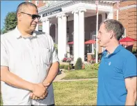  ?? 46#.*55&% 1)050 ?? Northeast PHP 2017 conference chairman Peter MacIntyre, left, and conference participan­t Lincoln Maskey discuss plans for this year’s event, which will see dozens of IT experts from across North American meet Aug. 9-11 at the Rodd Charlottet­own Hotel.