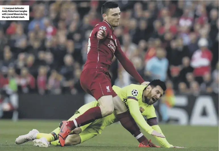  ??  ?? 3 Liverpool defender Andy Robertson tangles with Lionel Messi during the epic Anfield clash.