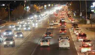  ?? Daily Courier file photo ?? Traffic rolls along Highway 97 near Spall Road last fall. The car is king among Kelowna area commuters, with 81 per cent of adults driving themselves to work, compared to the provincial average of 70 per cent, census data shows.