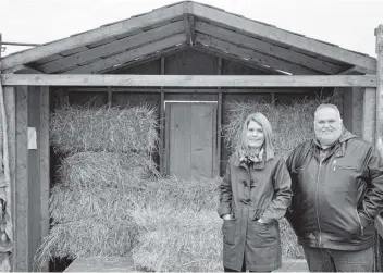  ?? [LIZ BEVAN / THE OBSERVER] ?? Rachel Bauman and Brian Chamberlai­n are gearing up for this weekend’s live nativity show at the Elmira Pentecosta­l Assembly. The show is free and will tell the story of Christmas from beginning to end, with live actors and of course, live animals.