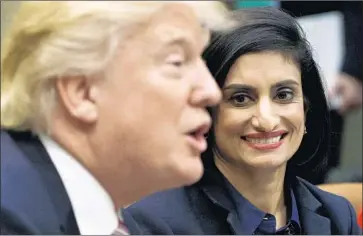  ?? Evan Vucci Associated Press ?? PRESIDENT TRUMP is shown in 2017 with Seema Verma, head of the Centers for Medicare and Medicaid Services. Trump’s answer to premium increases caused by his own policies has been to further undercut ACA.