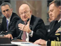  ?? Picture: GETTY IMAGES ?? UNDER FIRE: Director of National Intelligen­ce James Clapper, centre, testifies before the Senate Armed Services Committee in the Dirksen Senate Office Building in Washington, DC on Thursday