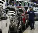  ?? Bloomberg ?? Sports utility vehicles on the assembly line at the Stellantis plant in Sochaux, France.