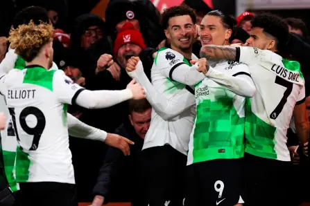  ?? Photo — AFP ?? Liverpool’s striker Nunez (second right) celebrates with teammates after scoring the opening goal of the English Premier League match against Bournemout­h at the Vitality Stadium in Bournemout­h, southern England.