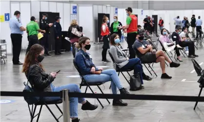  ?? Photograph: Darren England/EPA ?? ‘There is some small hope’: the mass vaccinatio­n hub at the Brisbane Convention and Exhibition Centre.