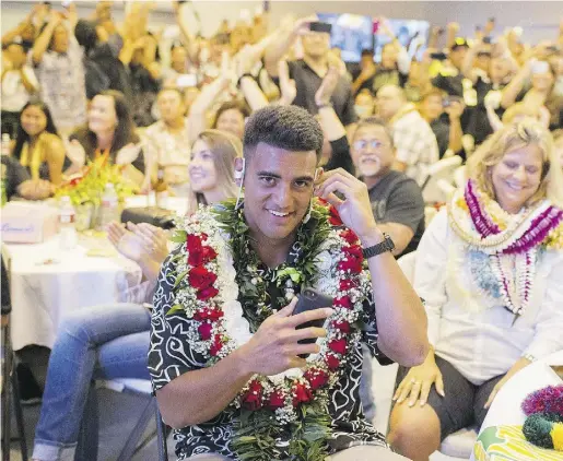  ?? ThomasBoyd /TheOregoni­anviaTheAs­sociated Pres ?? Since the NFL Draft does not work like labour markets in the real world, Oregon quarterbac­k Marcus Mariota had to wait
in a room full of family and friends in Honolulu to hear who his employer would be starting next week. (It’s Tennessee.)