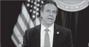  ?? FRANK FRANKLIN II / ASSOCIATED PRESS ?? New York Gov. Andrew Cuomo speaks during a May 10 news conference in New York. On Aug. 15, at a bill signing event in Manhattan, Cuomo said America “was never that great” during remarks criticizin­g President Donald Trump and his slogan “Make America Great Again.”