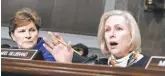  ?? J. SCOTT APPLEWHITE, AP ?? Sen. Kirsten Gillibrand, D- N. Y., right, with Sen. Jeanne Shaheen, D- N. H., questionsM­arine Corps Commandant Robert Neller at a Senate Armed Services Committee hearing Tuesday.