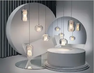  ?? PHOTOS (3): COURTESY OF CELADON ?? Lee Broom’s sculptural Chamber lights, in both large and small format, each feature a Carrara marble diffuser housed in a lead crystal vessel.