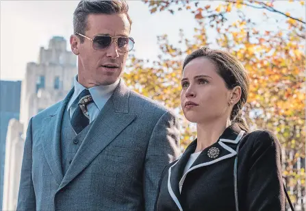  ?? JONATHAN WENK FOCUS FEATURES ?? Armie Hammer, left, plays Marty Ginsburg opposite Felicity Jones as Ruth Bader Ginsburg in "On the Basis of Sex."