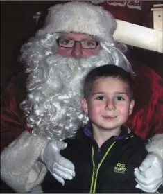  ??  ?? Oisín Breen, Clologue, Camolin, with Santa.