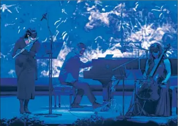  ?? Photograph­s by Gina Ferazzi Los Angeles Times ?? FLUTIST Rose Lomardo, from left, pianist Conrad Tao and cellist Alisa Weilerstei­n perform at the Conrad.