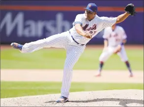  ?? Julio Cortez / Associated Press ?? New York Mets relief pitcher Jeurys Familia strikes out San Francisco Giants’ Stephen Vogt for the final out on Thursday in New York. The Mets won 7-3.