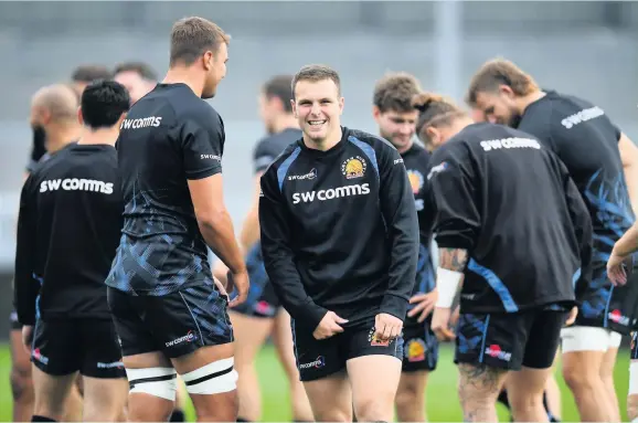  ?? Dan Mullan ?? Exeter Chiefs’ Joe Simmonds shares a joke with Sam Skinnerdur­ing a training session at Sandy Park in the build up to tomorrow’s big semi-final