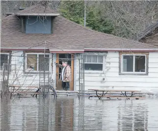  ?? PETER MCCABE ?? High waters in Île Mercier in Île Bizard, in the borough of L’Île-Bizard–Sainte-Geneviève Thursday.