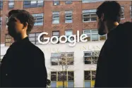  ?? Associated Press ?? People walk by Google offices in New York. A week after high-paid engineers and others walked out in protest over its male-dominated culture, Google is promising to be more forceful and open about its handling of sexual misconduct cases.