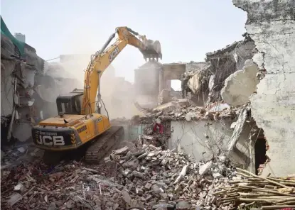  ?? SANJAY KANOJIA/AFP VIA GETTY IMAGES ?? The home of Javed Muhammad, a Muslim leader and activist who organized protests against India’s Bharatiya Janata Party, is demolished on June 12 in Allahabad, India.