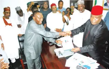  ?? PHOTO: NAN ?? Organising Secretary of APC, Sen Osita Izunaso (right); presenting a Governorsh­ip Nomination/expression of Interest Form to a gubernator­ial aspirant for the Anambra Governorsh­ip Election, Sen. Andy Uba in Abuja on 19/7/2017