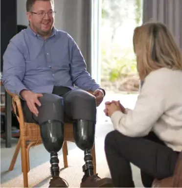  ??  ?? Fighting back: Surgeon Neil Hopper demonstrat­es the prosthetic legs he now uses