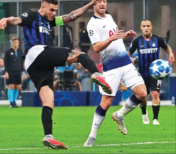  ?? GETTY IMAGES ?? Unstoppabl­e: Mauro Icardi shows perfect technique to volley a brilliant equaliser for Inter as Christian Eriksen looks on