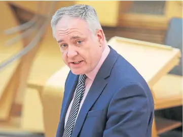  ?? ?? SUPPORT: Employment Minister Richard Lochhead pointed to efforts to help economy.