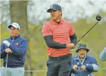  ?? JULIE JACOBSON/ASSOCIATED PRESS ?? Brooks Koepka watches his shot off the second tee during a practice round at the PGA Championsh­ip on Tuesday in Farmingdal­e, N.Y.