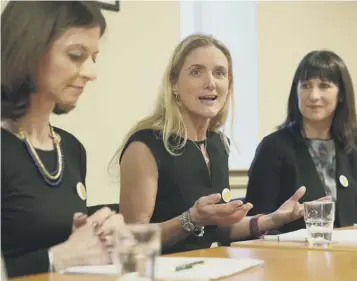  ??  ?? Kim Leadbeatte­r, Jo Cox’s sister, and MPS Rachel Reeves and Seema Kennedy launch the report