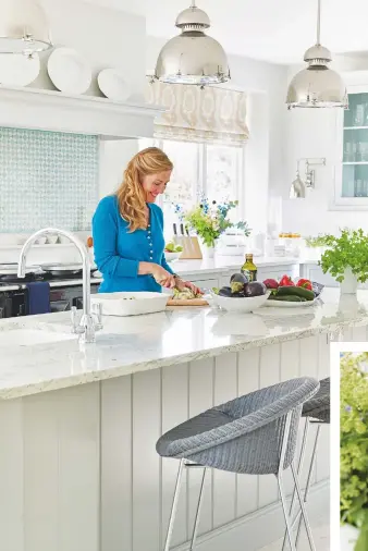  ??  ?? ABOVE A granite-topped island from Martin Moore’s English Collection is ideal for preparing meals. Handled roasting dish,
£56; medium salad bowl, £32; both Sophie Conran for Portmeirio­n. RIGHT Simple extras complement a paredback look. Utensil jar,...