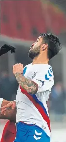  ?? Picture: Getty. ?? Rangers midfielder Daniel Candeias, right, in action against Lorenzo Melgarejo.