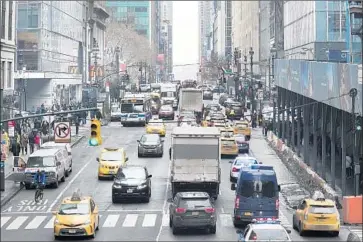  ?? Mary Altaffer Associated Press ?? A NEW YORK task force recommends pay-as-you-go congestion fees to enter midtown Manhattan. The report comes in response to what Gov. Andrew Cuomo has declared a state of emergency in the transit system.