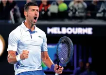  ?? ASANKA BRENDON RATNAYAKE THE ASSOCIATED PRESS ?? Novak Djokovic of Serbia celebrates during his fourth-round match against Adrian Mannarino of France on Sunday at the Australian Open at Melbourne Park in Melbourne, Australia.